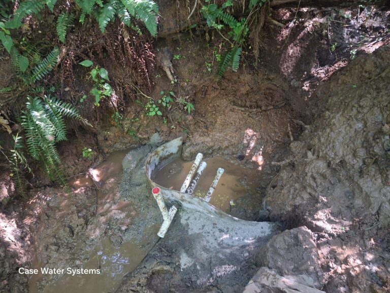 Existing mountain spring water collection and supply piping in Western North Carolina